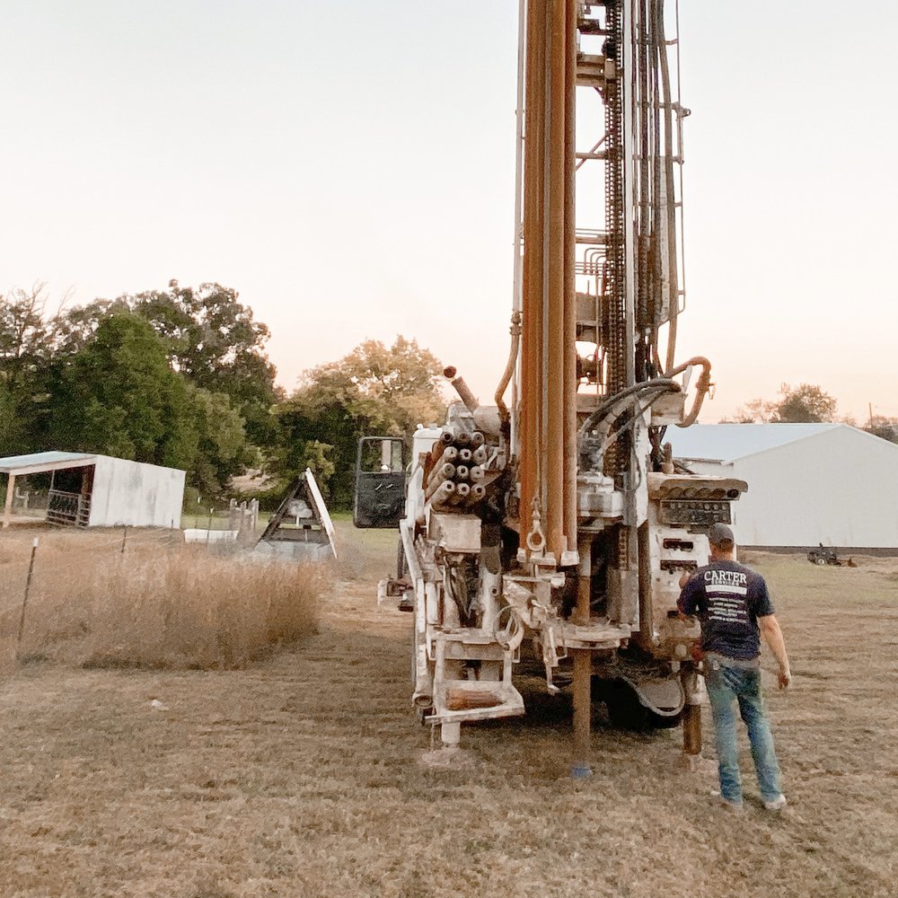 Water well drilling rig in South London site
